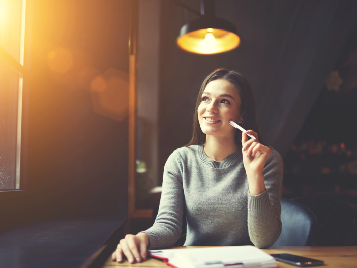 Woman thinking about different freelancer business models